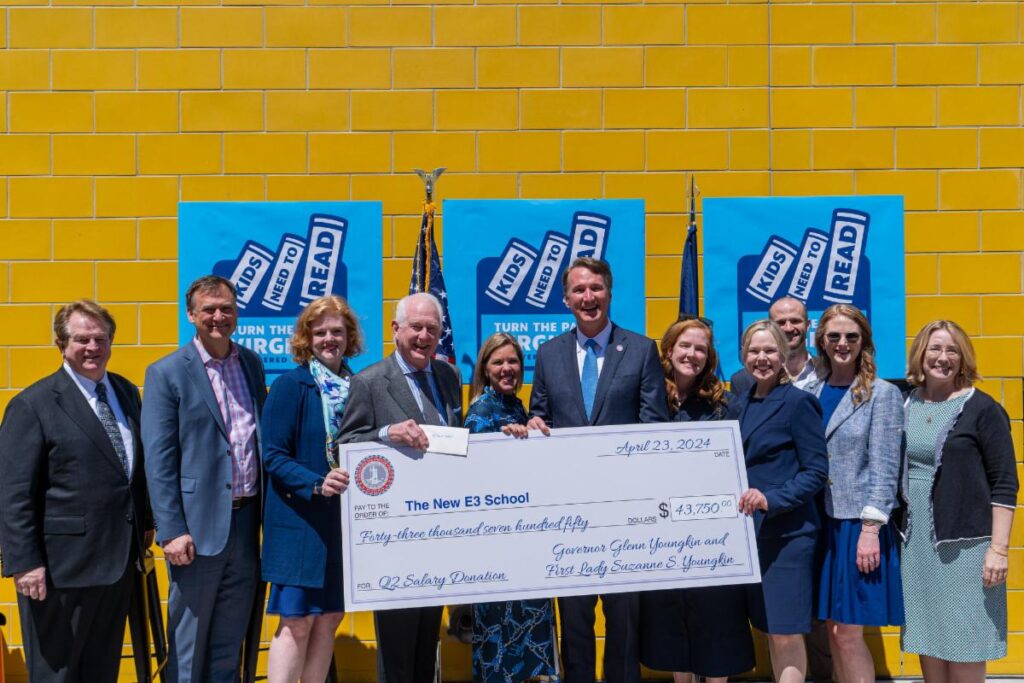 Governor Glenn Youngkin and First Lady Suzanne S. Youngkin with members of the Robertson family at The New E3 School