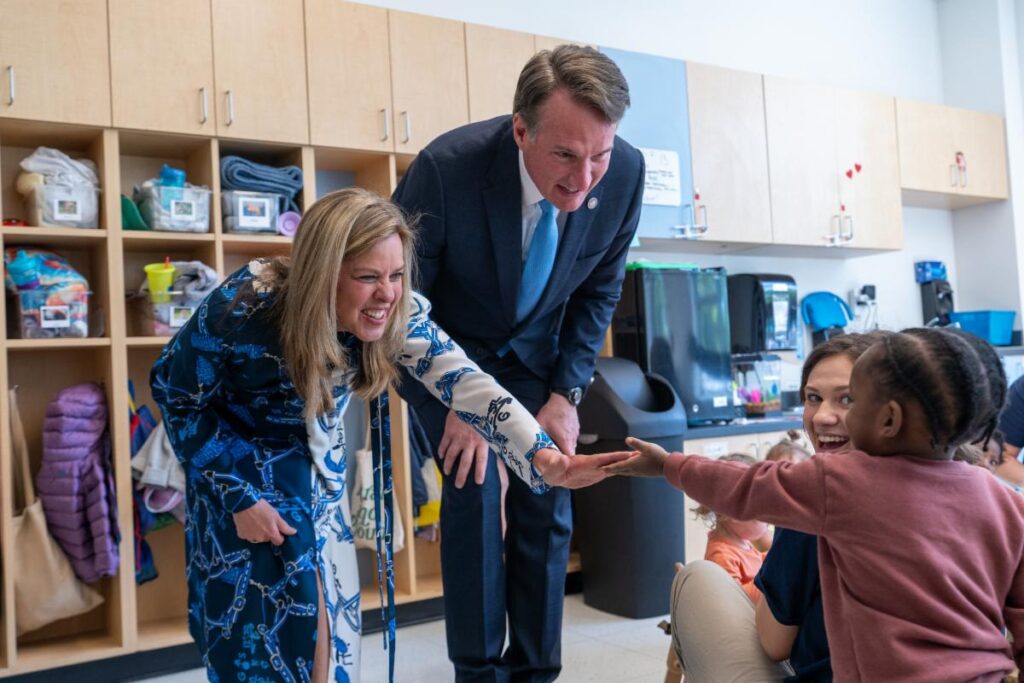 Governor Glenn Youngkin and First Lady Suzanne S. Youngkin with a student at The New E3 School 